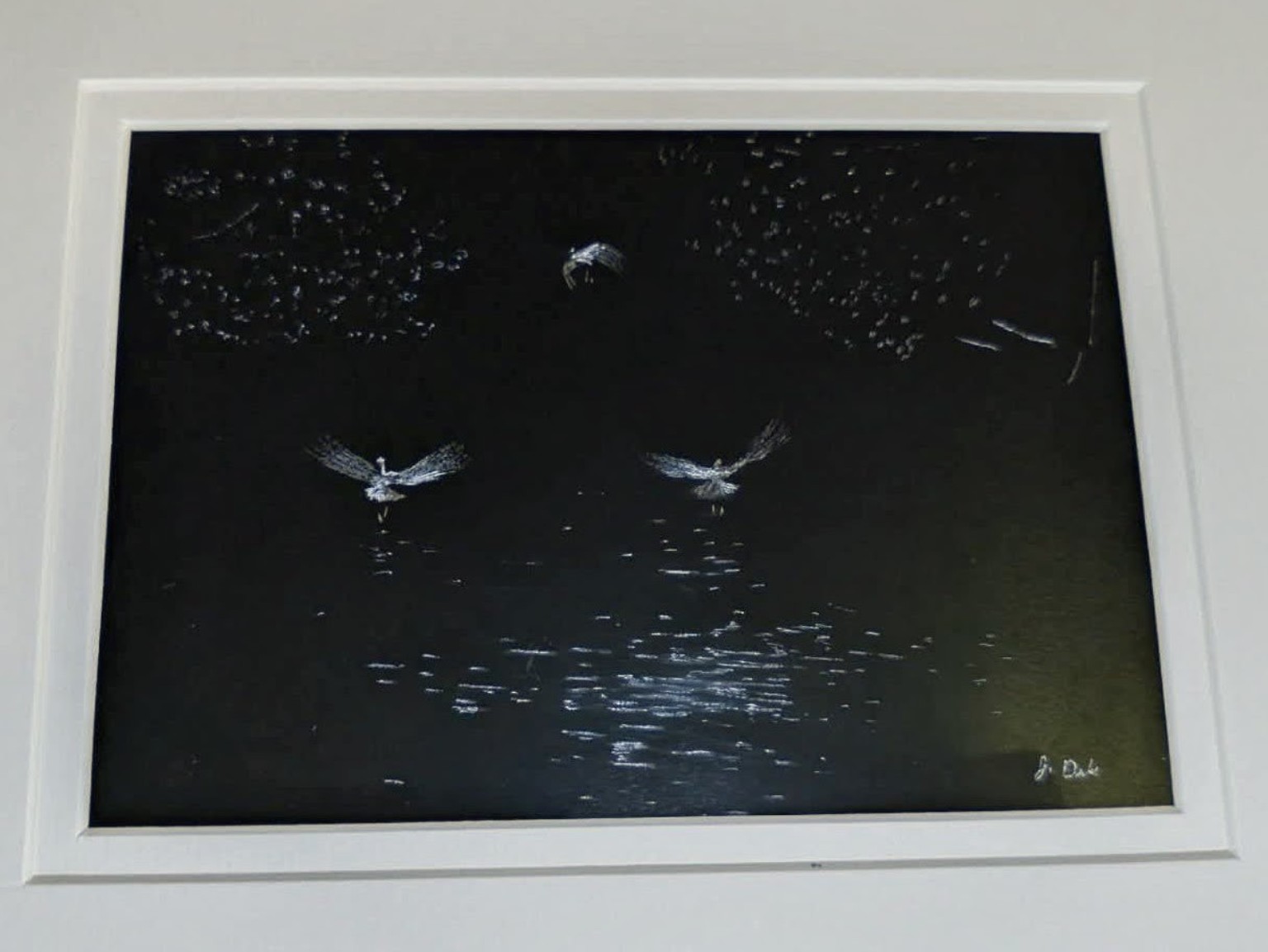 Etching of birds flying over water