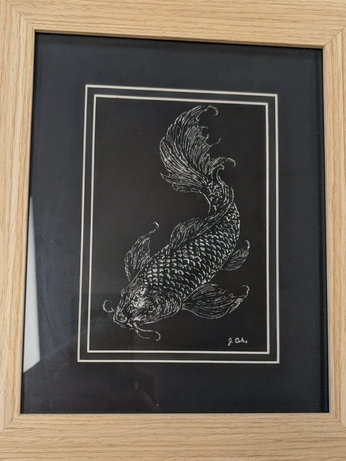 Framed koi fish etching